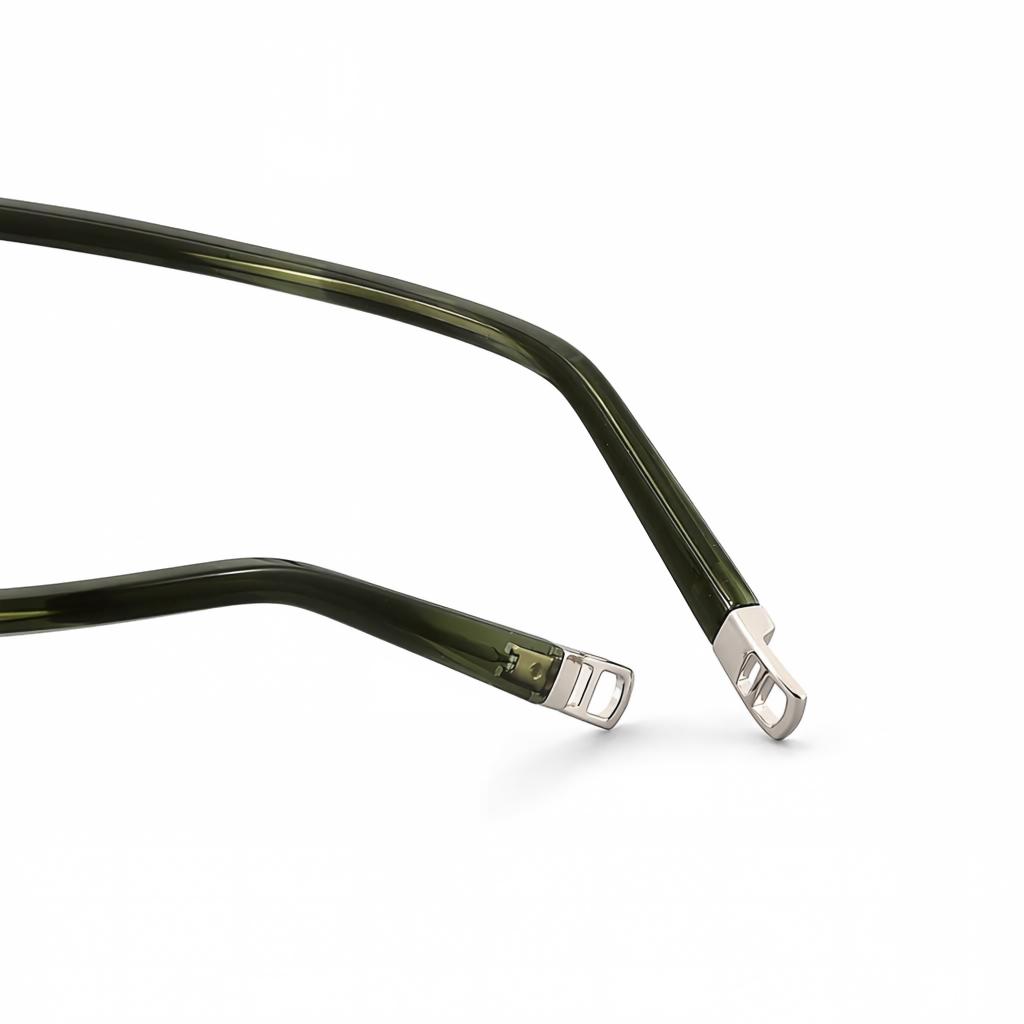 Mellume Titanium Eyewear Green Acetate Temple Tip Detail Translucent green acetate temple tips with hollowed metal end caps detail