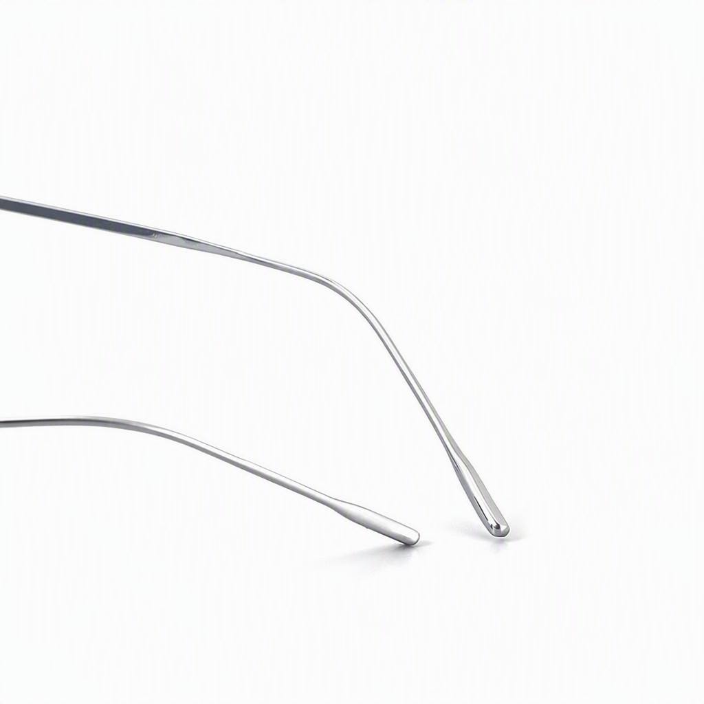 Custom Pure Titanium Grey Oval Sunglasses Temple Tip Detail Custom Pure Titanium Grey Oval Sunglasses Temple Tip Detail - Custom Eyewear Manufacturer
